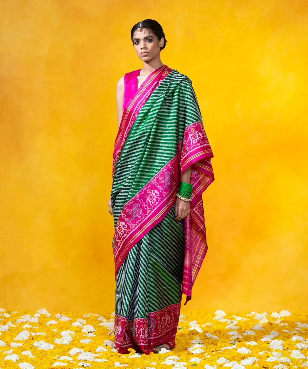 Green Handloom Mulberry Silk Diagonal Weave Ikat Patola Saree With Pink Border