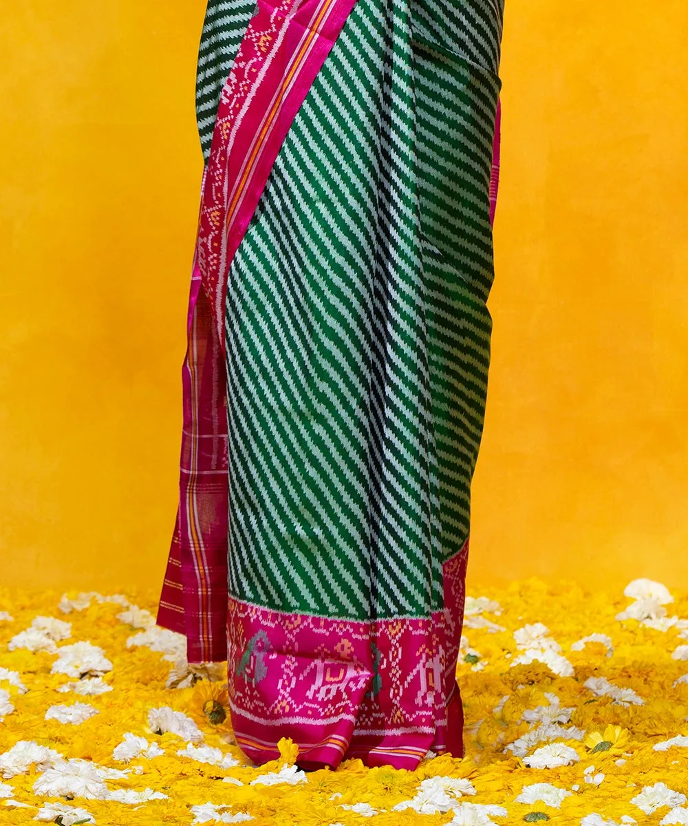 Green Handloom Mulberry Silk Diagonal Weave Ikat Patola Saree With Pink Border