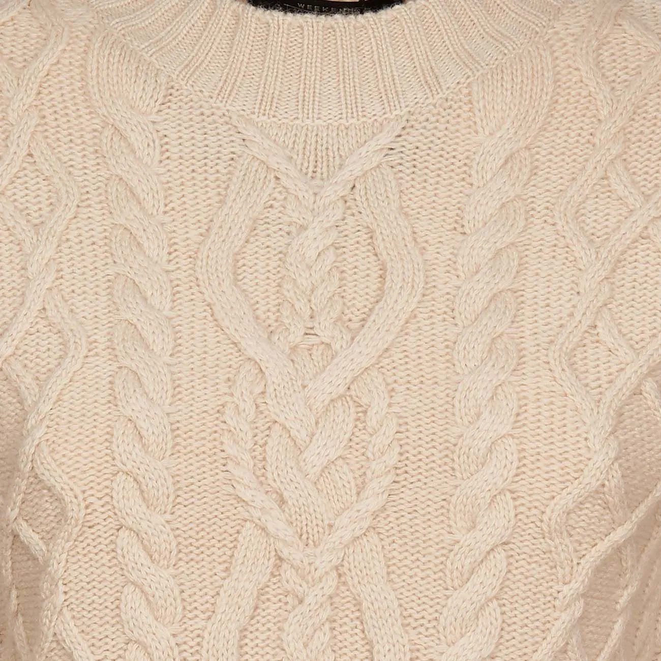 Ivory pullover with wool braided trims for women.