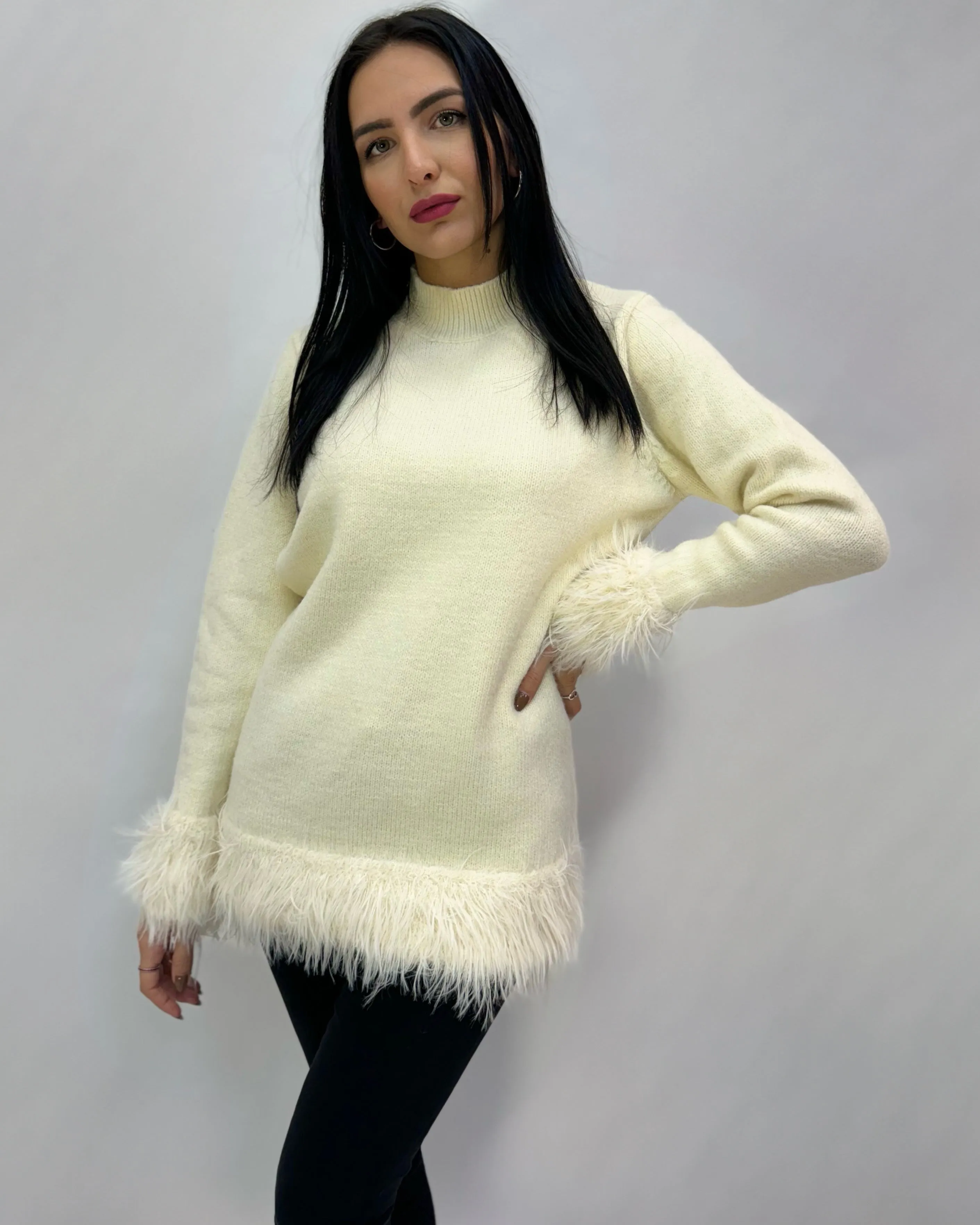 Soft long pullover with feathers