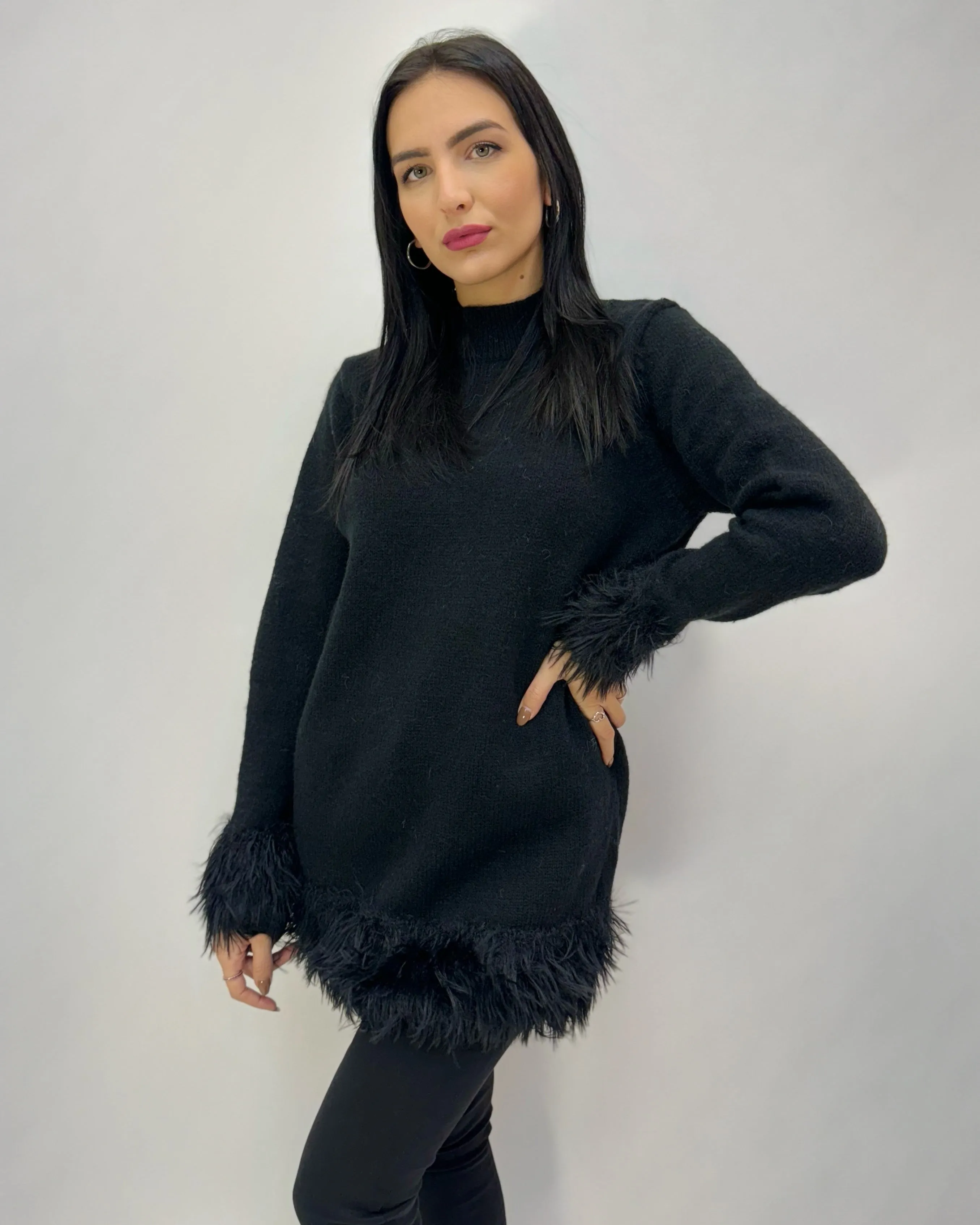 Soft long pullover with feathers