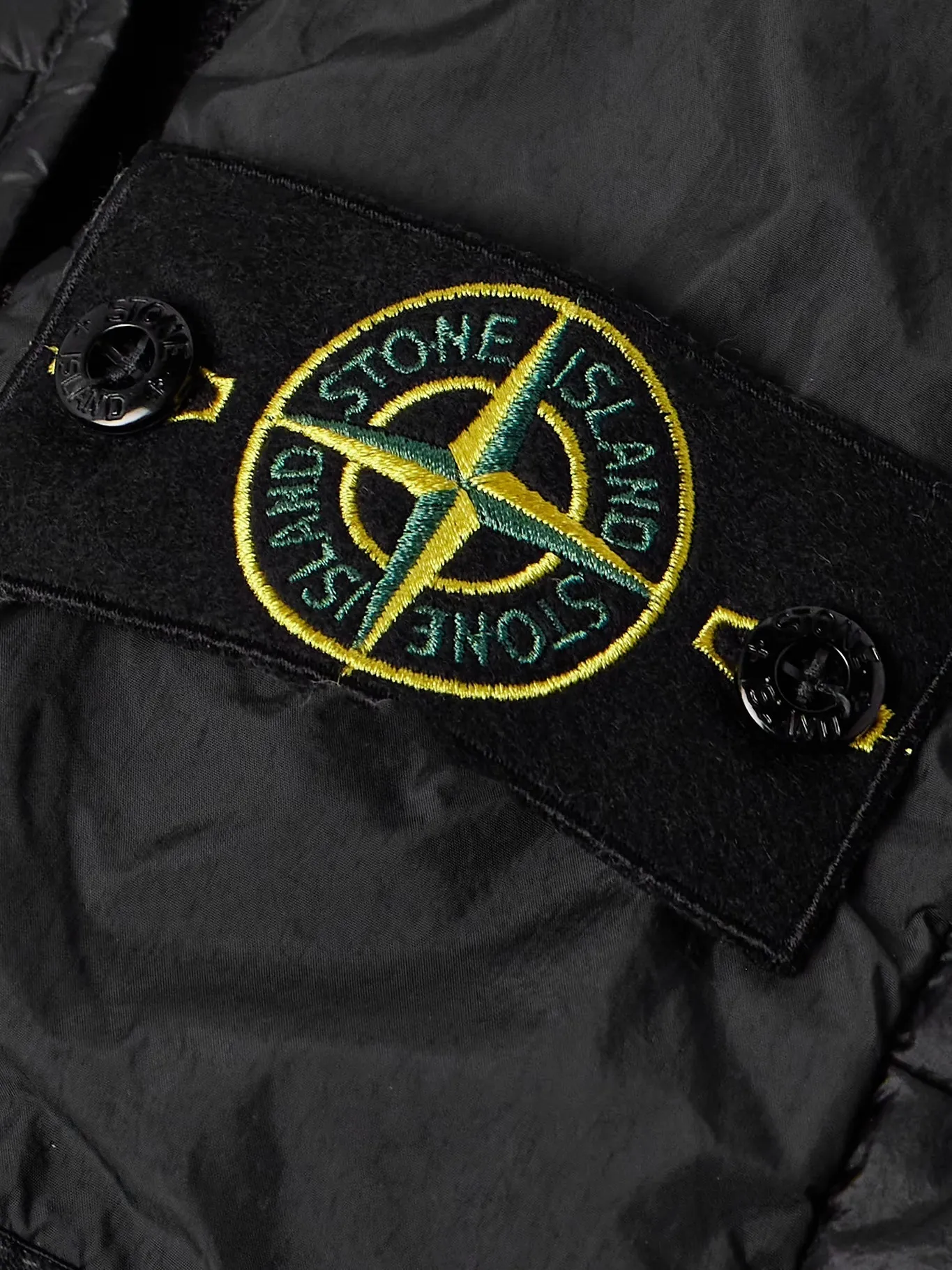 Stone Island logo vests and gillets.