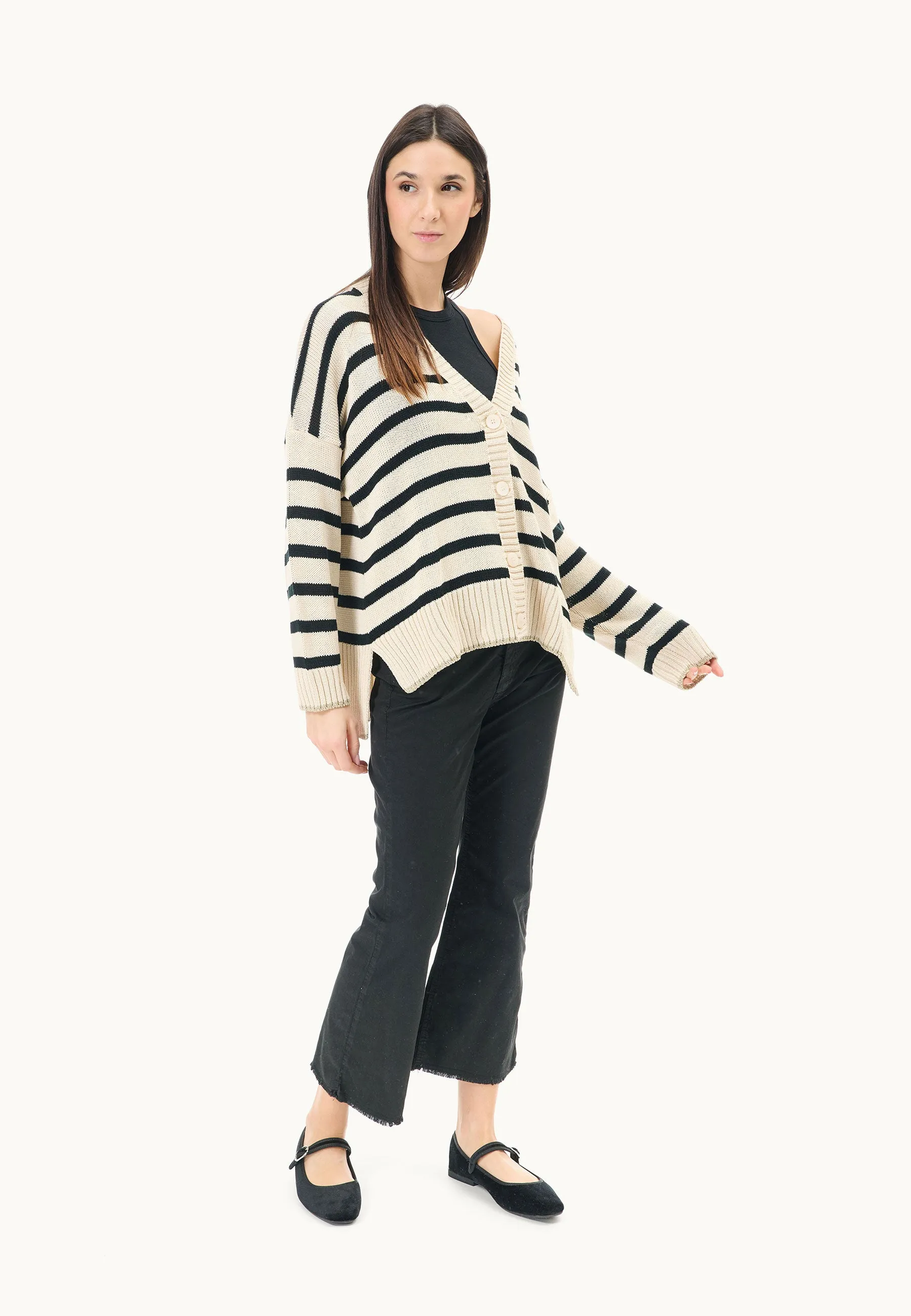 Sweater with lurex border over striped pattern.