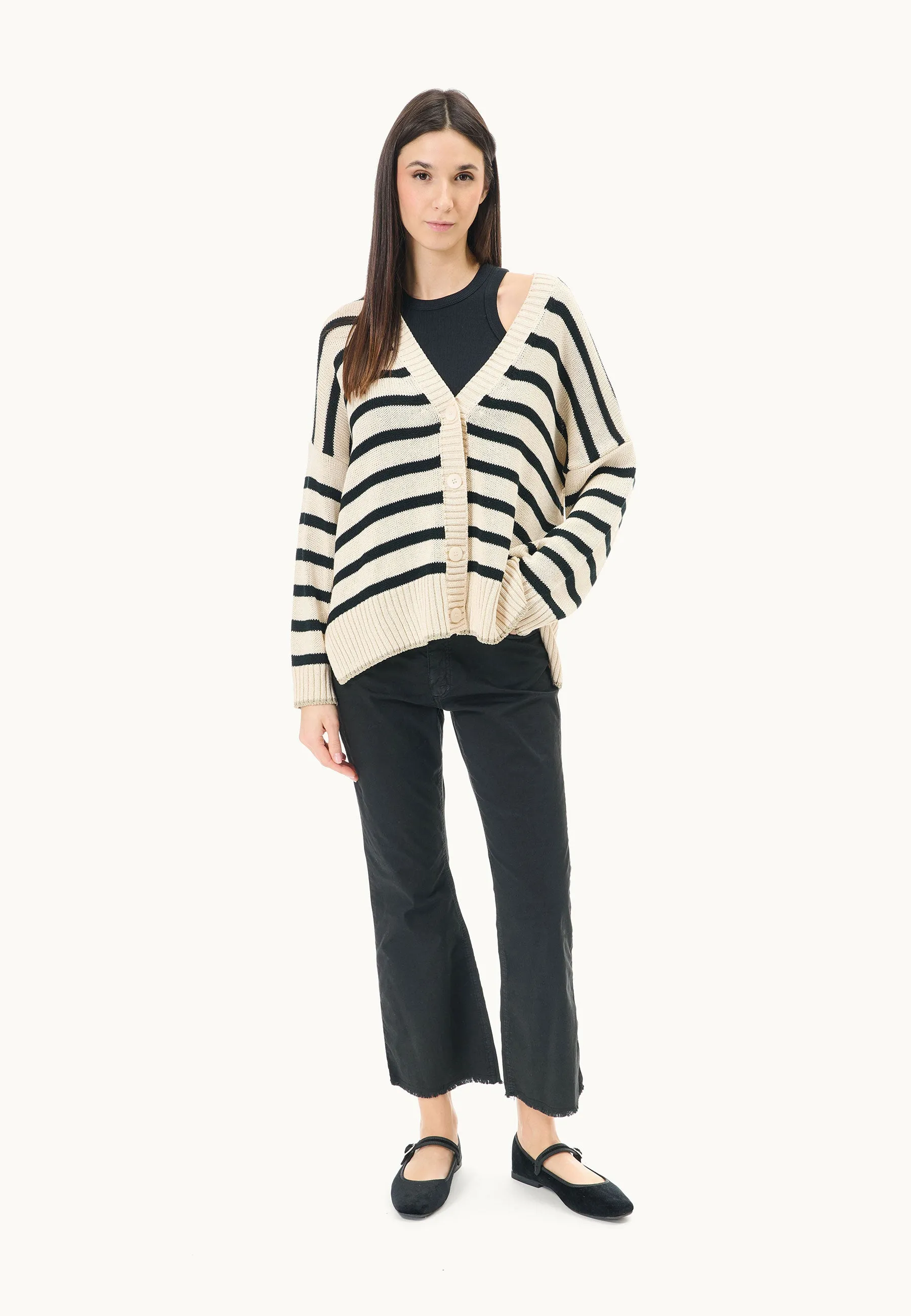 Sweater with lurex border over striped pattern.