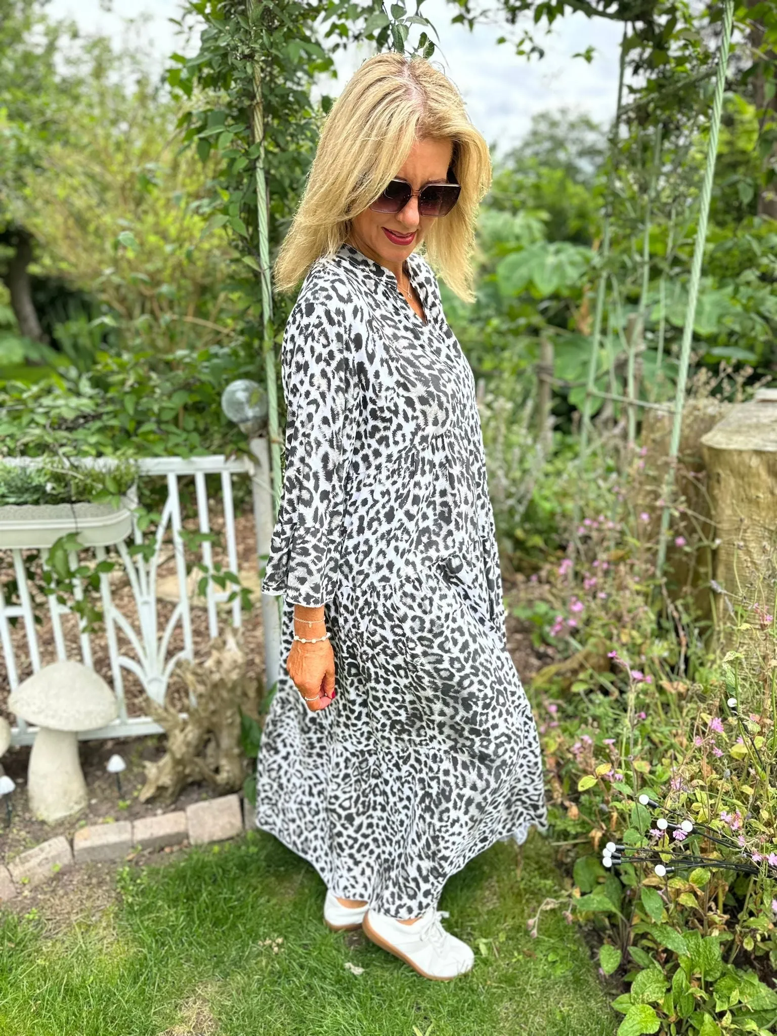 White Leopard Maxi Dress Betsy - Shop now for the best deal on a stunning white leopard print maxi dress, named Betsy.