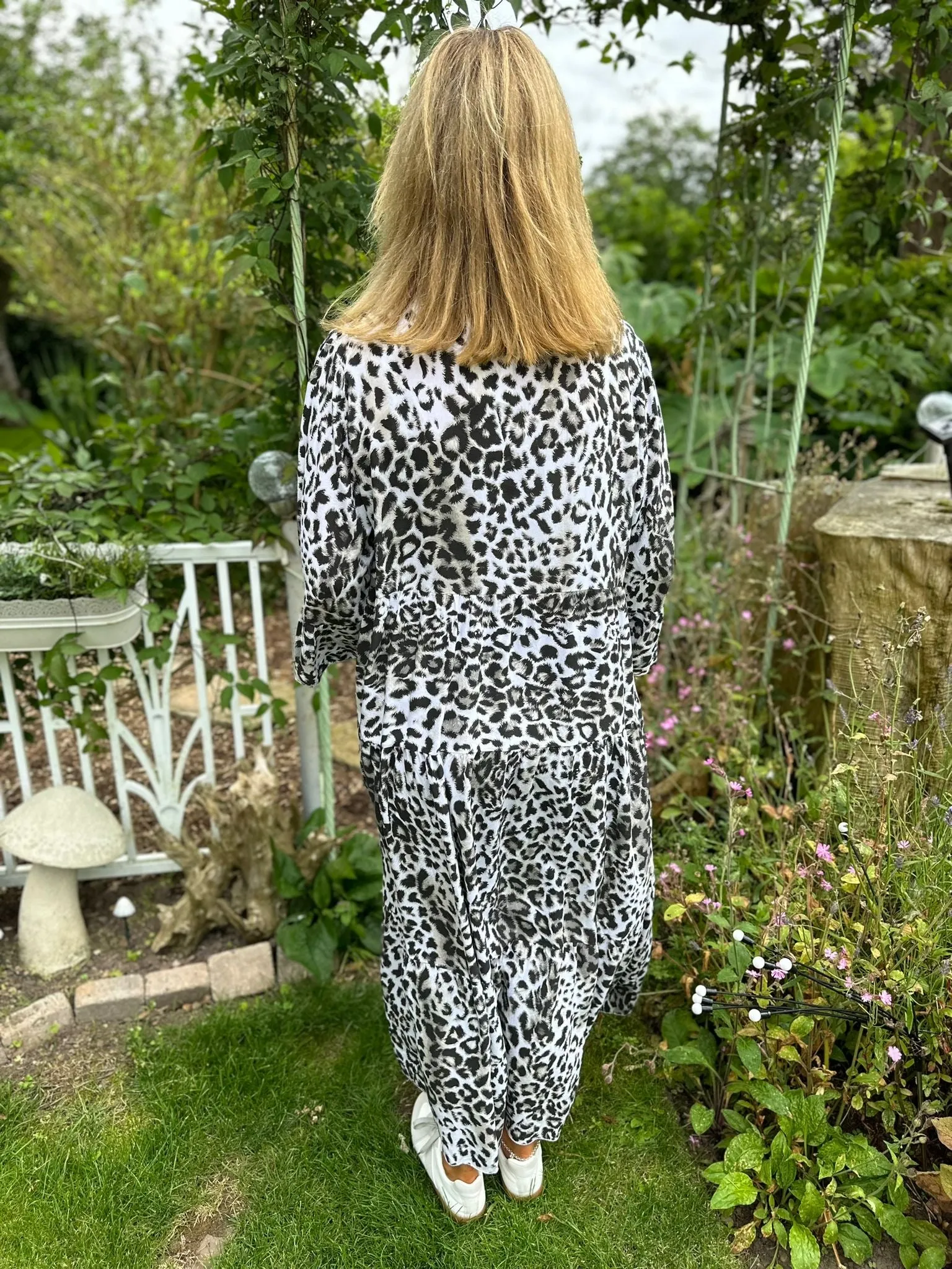 White Leopard Maxi Dress Betsy - Shop now for the best deal on a stunning white leopard print maxi dress, named Betsy.